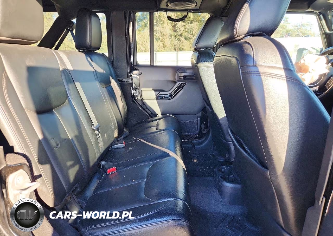2014 Jeep Wrangler Unlimited Sahara VIN:1C4BJWEG3EL301737 - 11