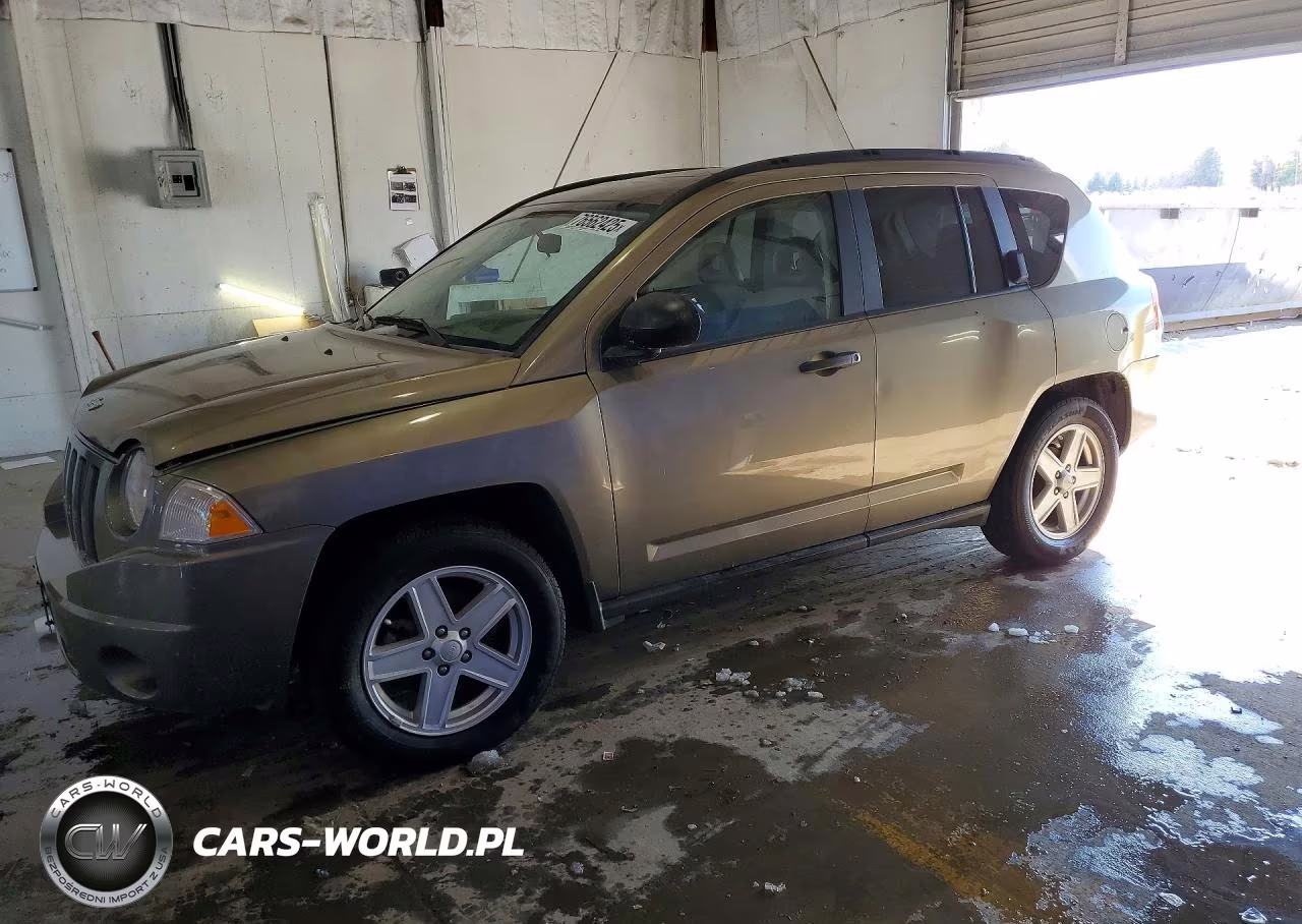 2010 Jeep Compass VIN:1J8FT47W07D204313 - 1