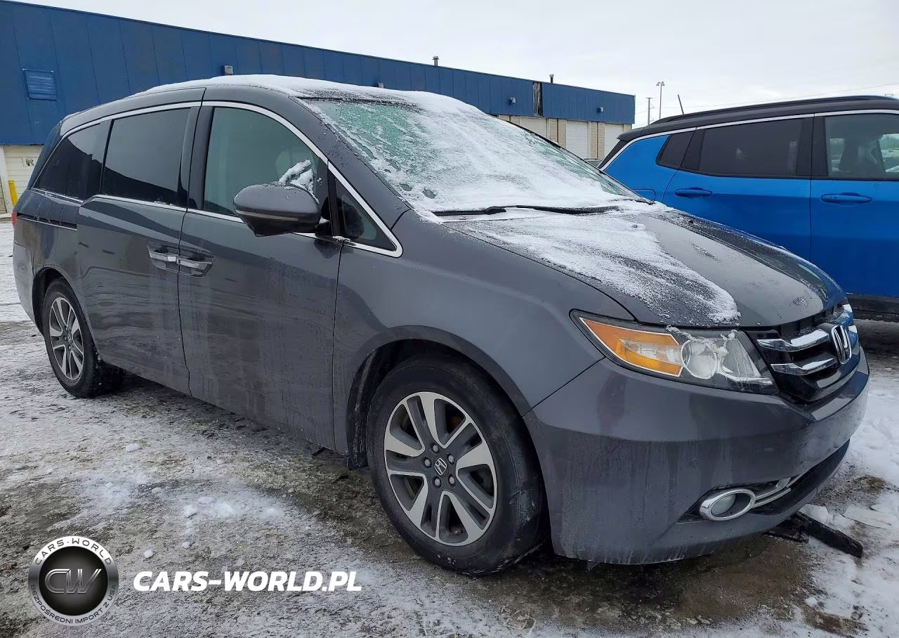 2017 Honda Odyssey Touring VIN:5FNRL5H91HB016137 - 4