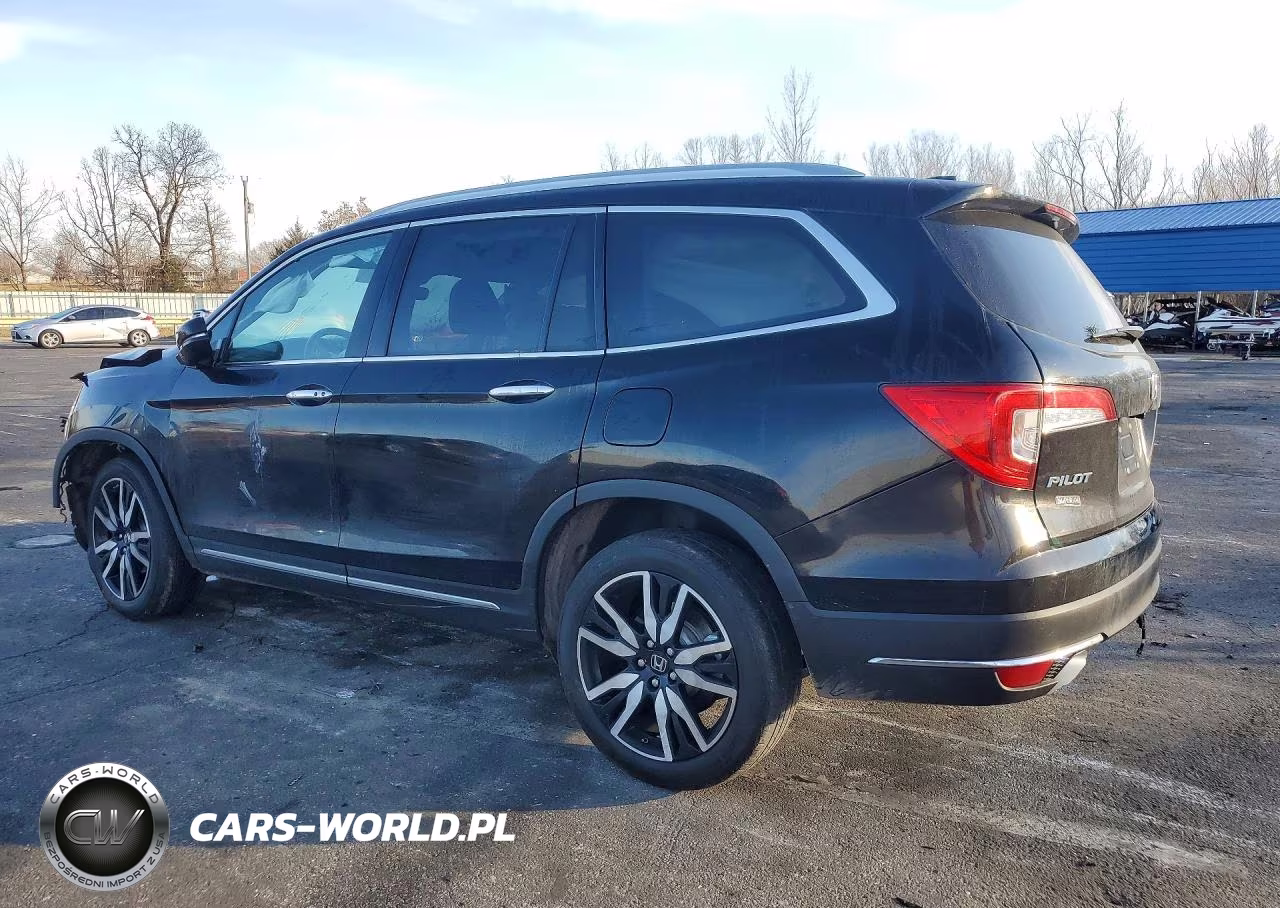 2022 Honda Pilot Touring VIN:5FNYF6H67NB025810 - 2