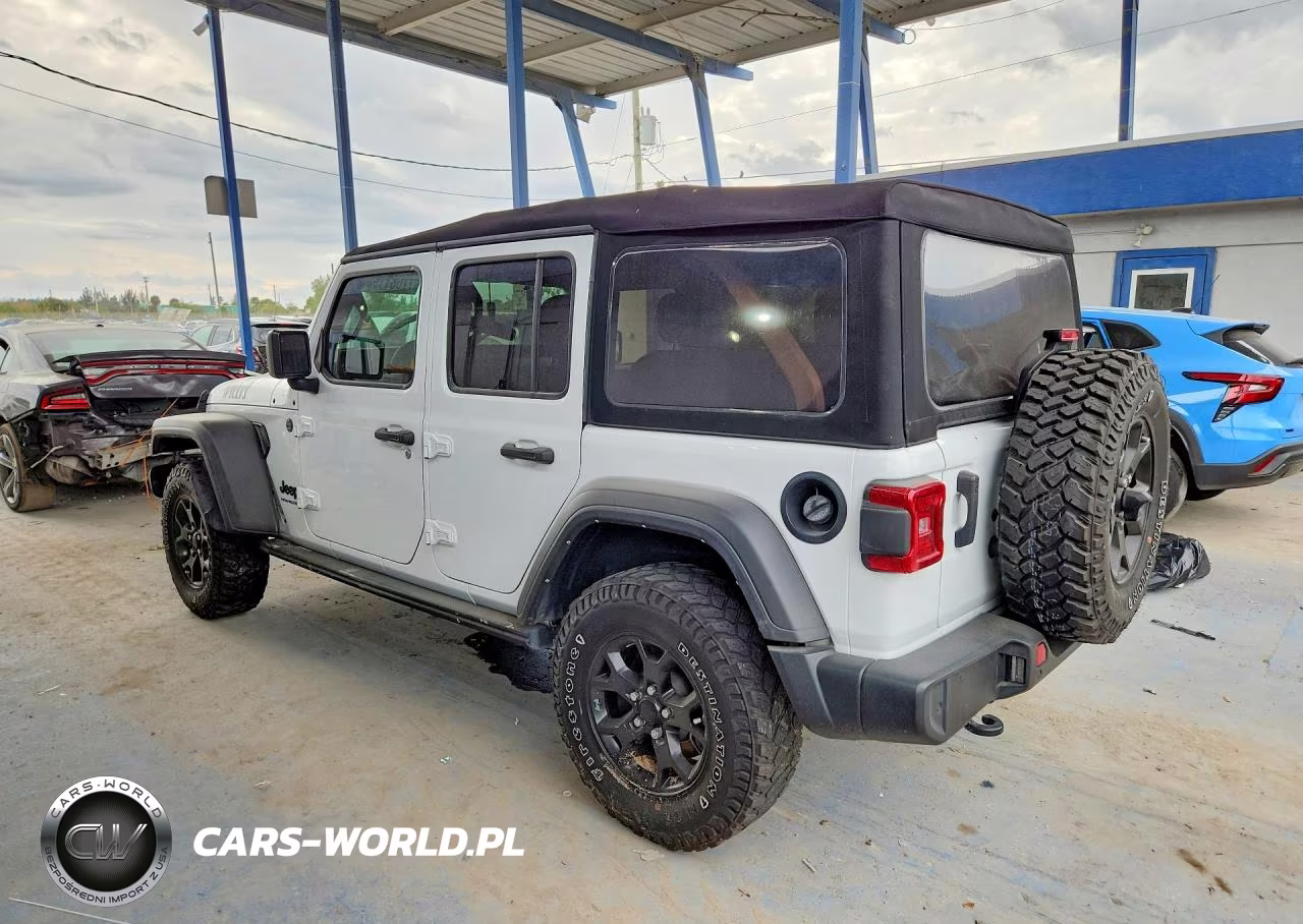 2023 Jeep Wrangler Sport VIN:1C4HJXDG4PW565584 - 2