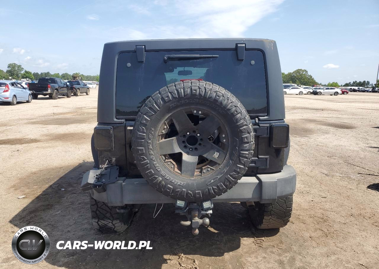 2015 Jeep Wrangler Unlimited Sport VIN:1C4BJWDG6FL556224 - 6