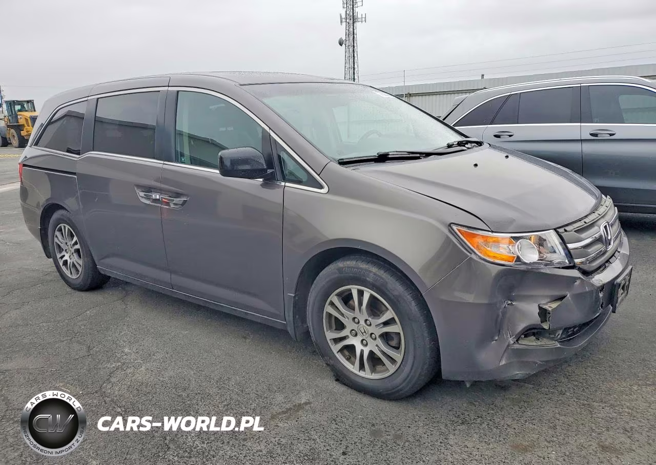 2011 Honda Odyssey Exl VIN:5FNRL5H69BB104673 - 4