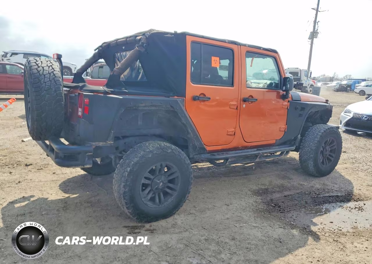 2011 Jeep Wrangler Unlimited Rubicon VIN:1J4BA6H18BL514339 - 3
