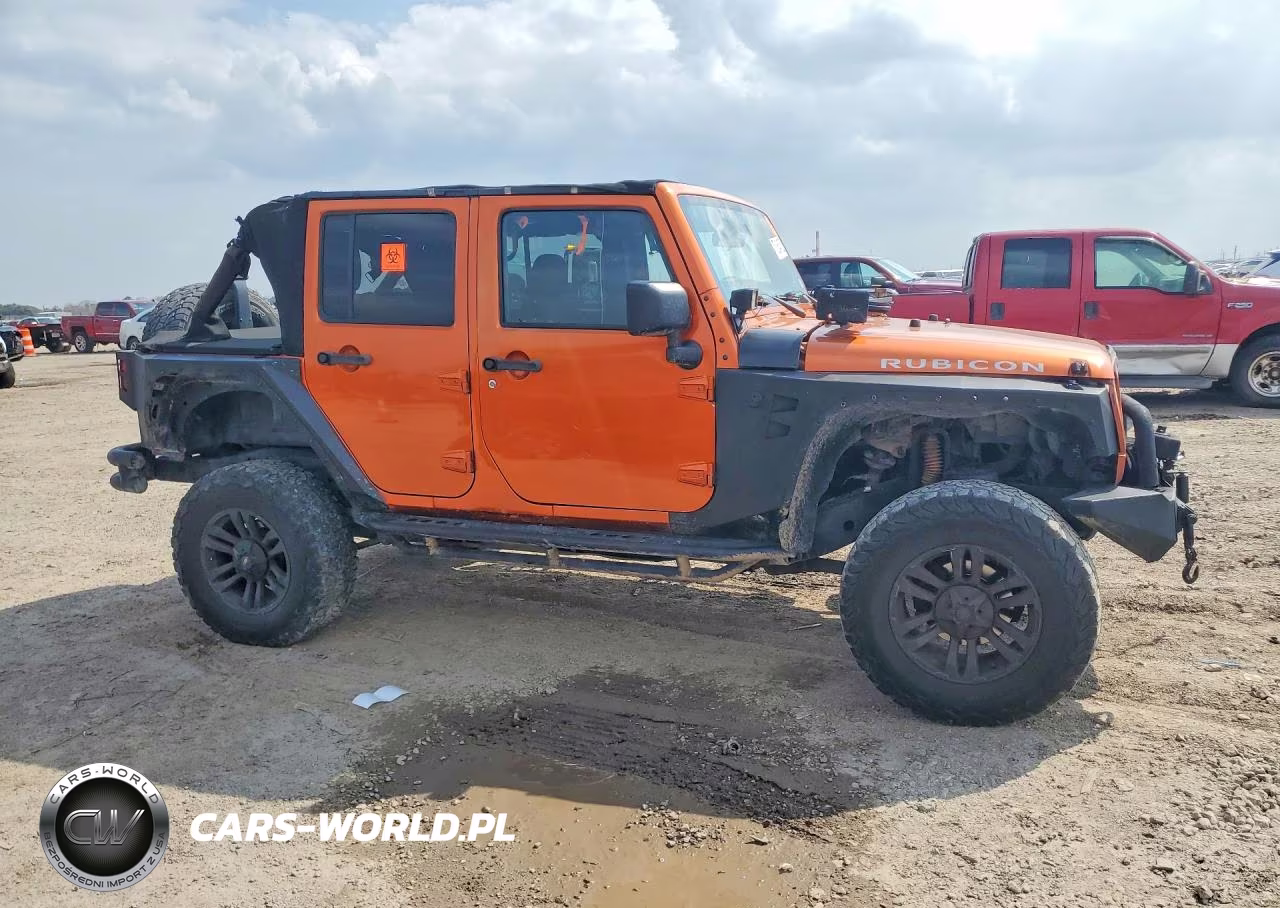 2011 Jeep Wrangler Unlimited Rubicon VIN:1J4BA6H18BL514339 - 4