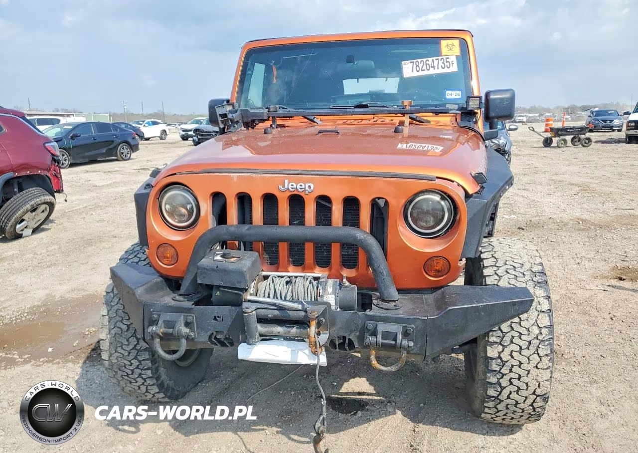 2011 Jeep Wrangler Unlimited Rubicon VIN:1J4BA6H18BL514339 - 5