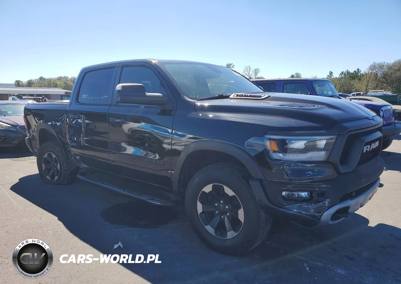 2019 Ram 1500 Rebel VIN:1C6SRFLT8KN715662 - 4