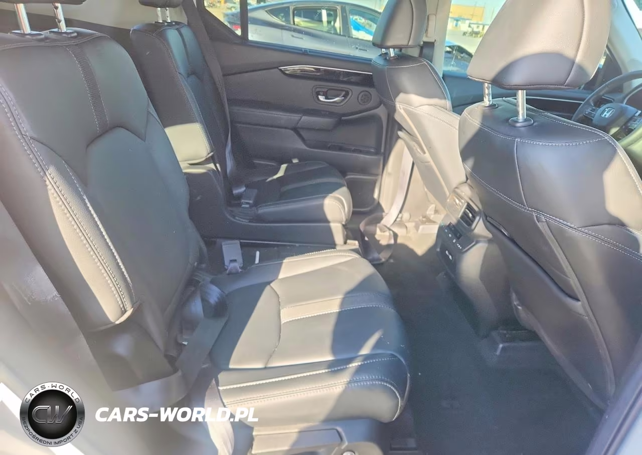 2023 Honda Pilot Touring VIN:5FNYG2H73PB001554 - 11