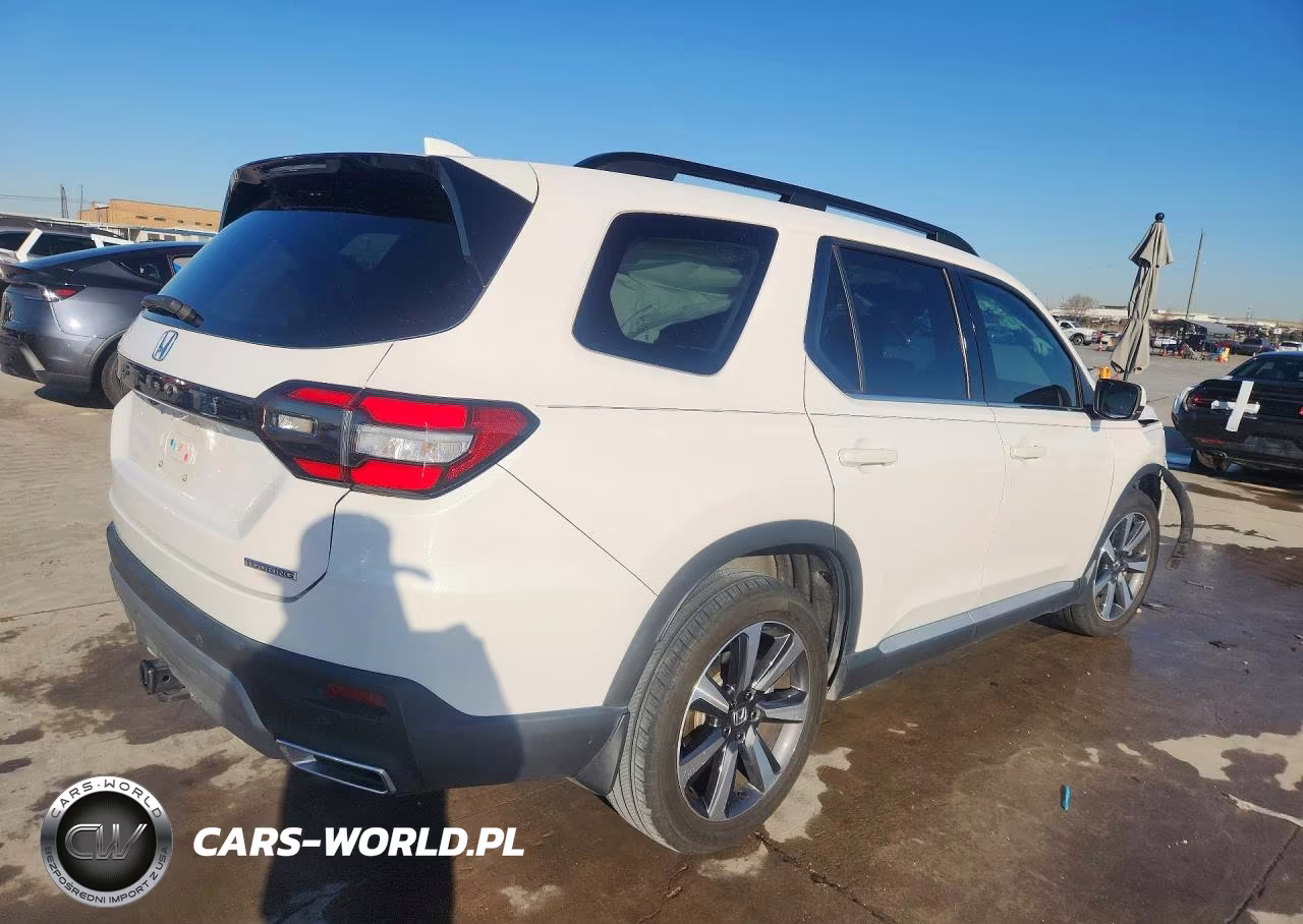 2023 Honda Pilot Touring VIN:5FNYG2H73PB001554 - 3