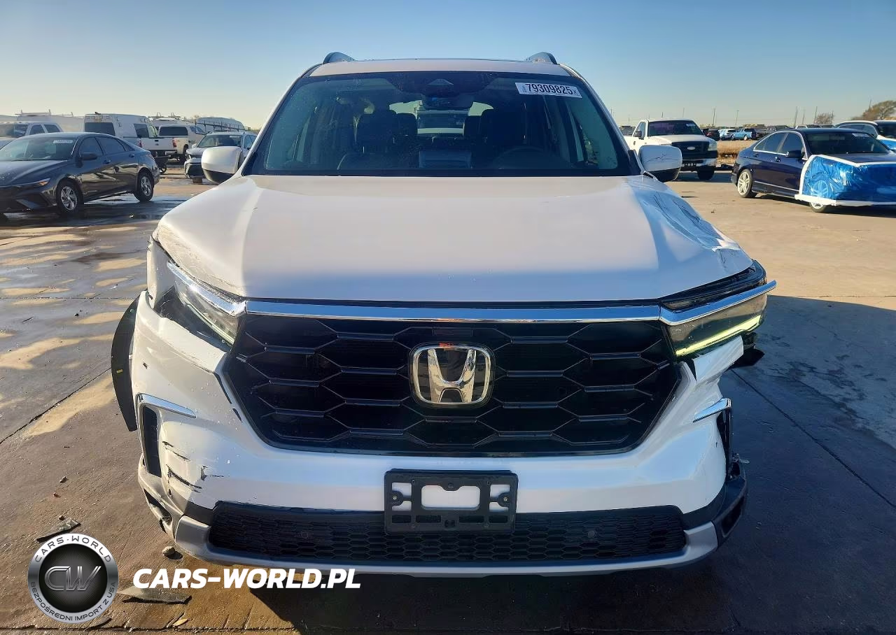 2023 Honda Pilot Touring VIN:5FNYG2H73PB001554 - 5