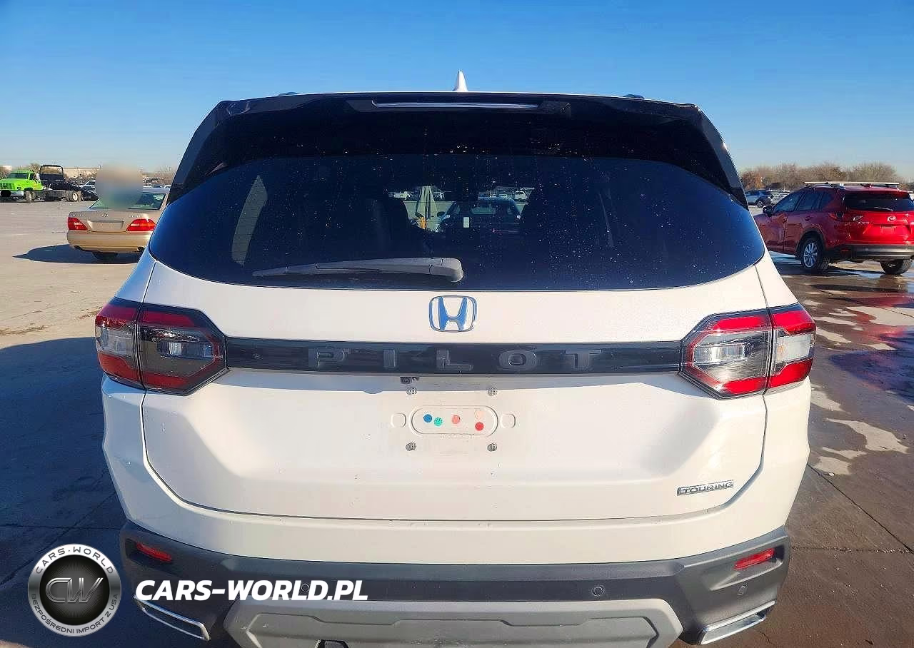 2023 Honda Pilot Touring VIN:5FNYG2H73PB001554 - 6