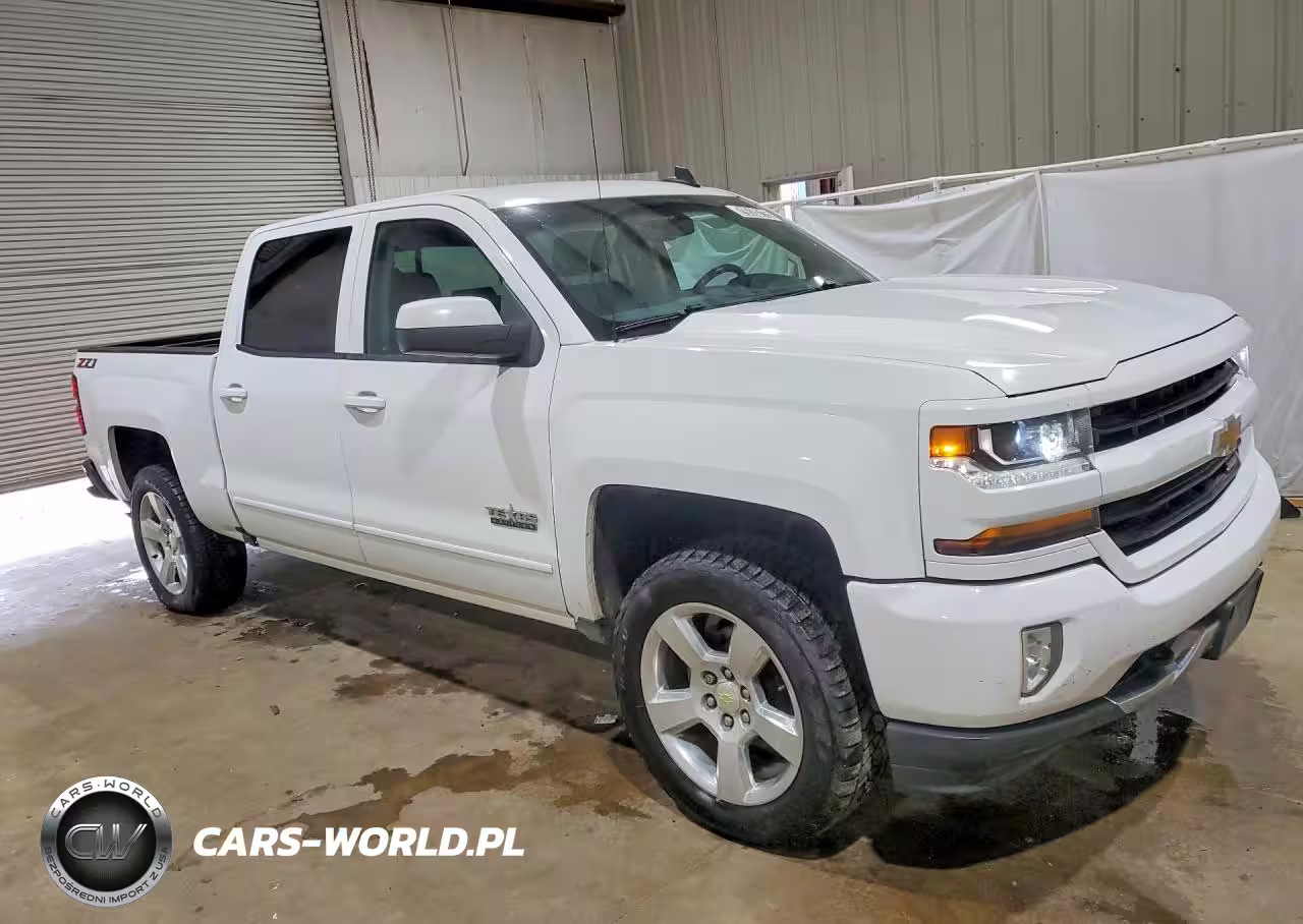 2018 Chevrolet Silverado K1500 Lt VIN:3GCUKREC6JG266834 - 4