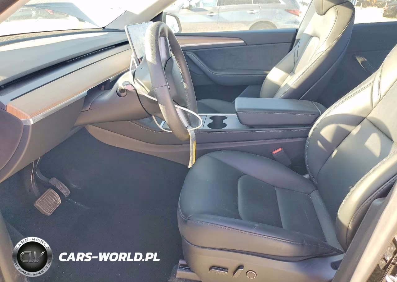 2023 Tesla Model Y VIN:7SAYGDEE2PA136832 - 7