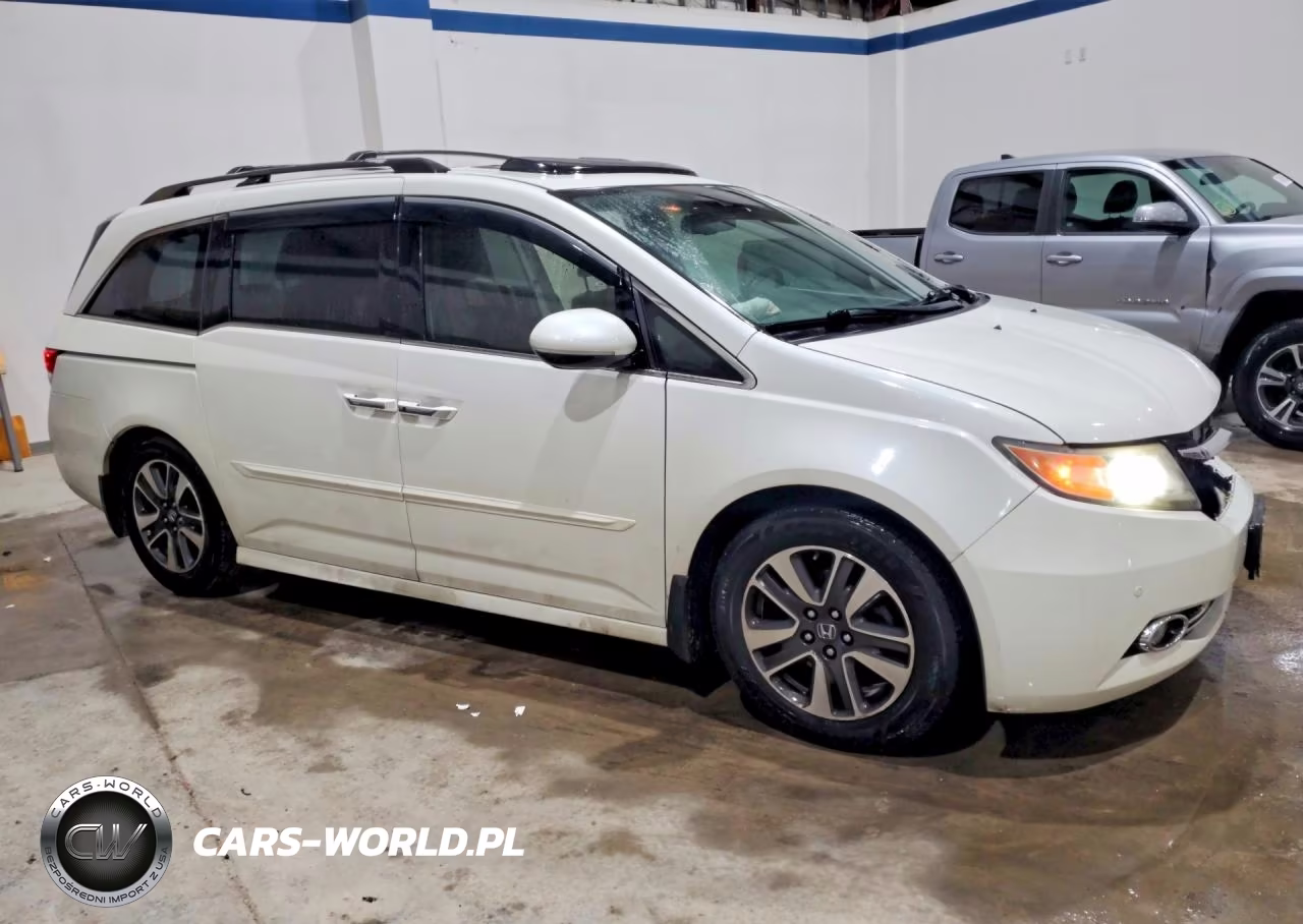 2014 Honda Odyssey Touring VIN:5FNRL5H97EB093915 - 4
