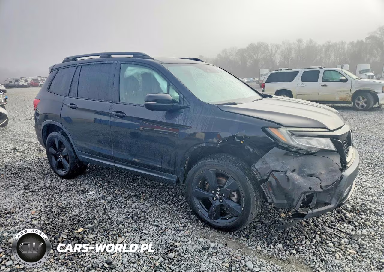 2019 Honda Passport Elite VIN:5FNYF8H09KB003133 - 4