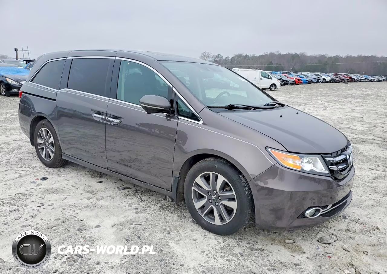 2016 Honda Odyssey Touring VIN:5FNRL5H90GB050388 - 4