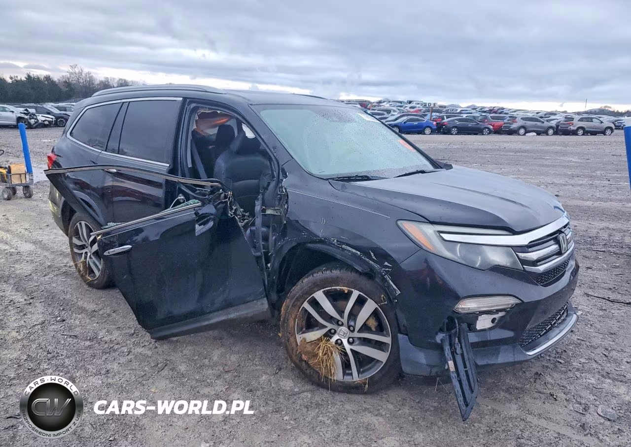 2018 Honda Pilot Elite VIN:5FNYF6H0XJB009915 - 4