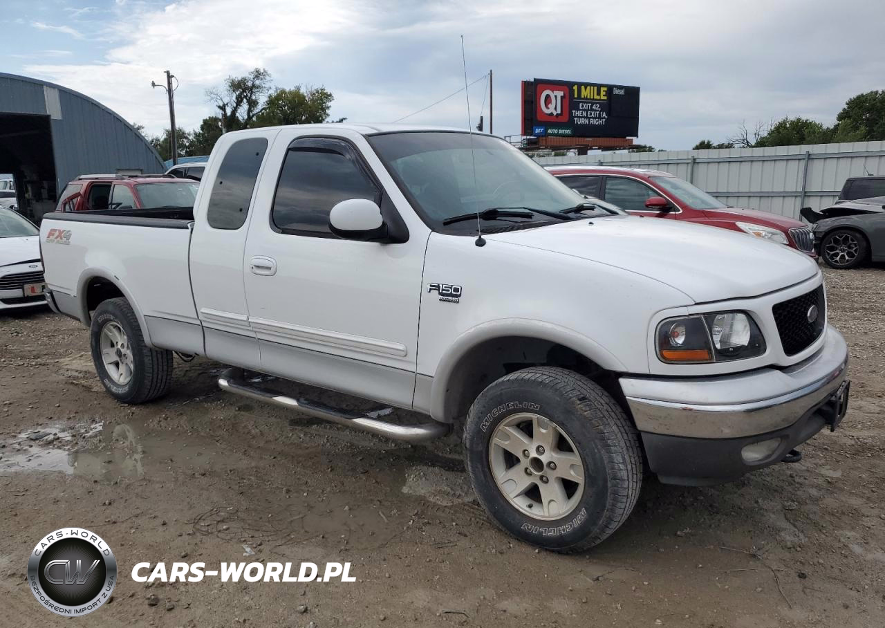 2002 Ford F150 VIN:1FTRX18L32NA89818 - 4