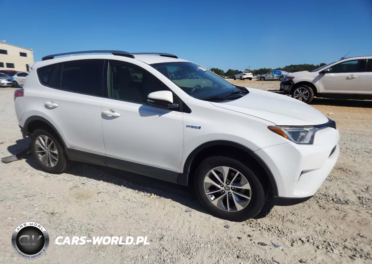 2018 Toyota Rav4 Hv Le VIN:JTMRJREV4JD210060 - 4