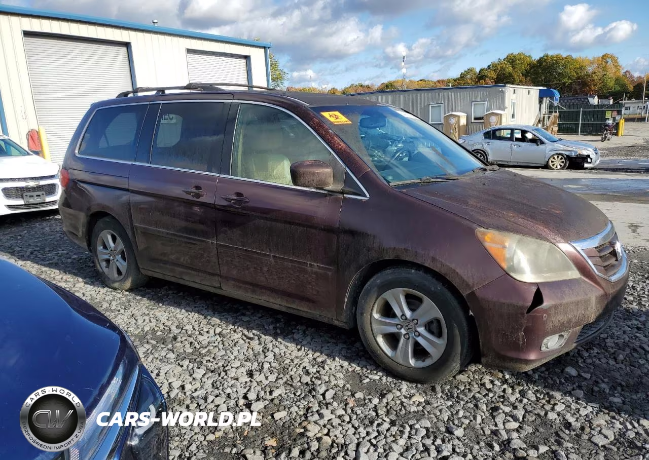 2010 Honda Odyssey Touring VIN:5FNRL3H97AB017089 - 4