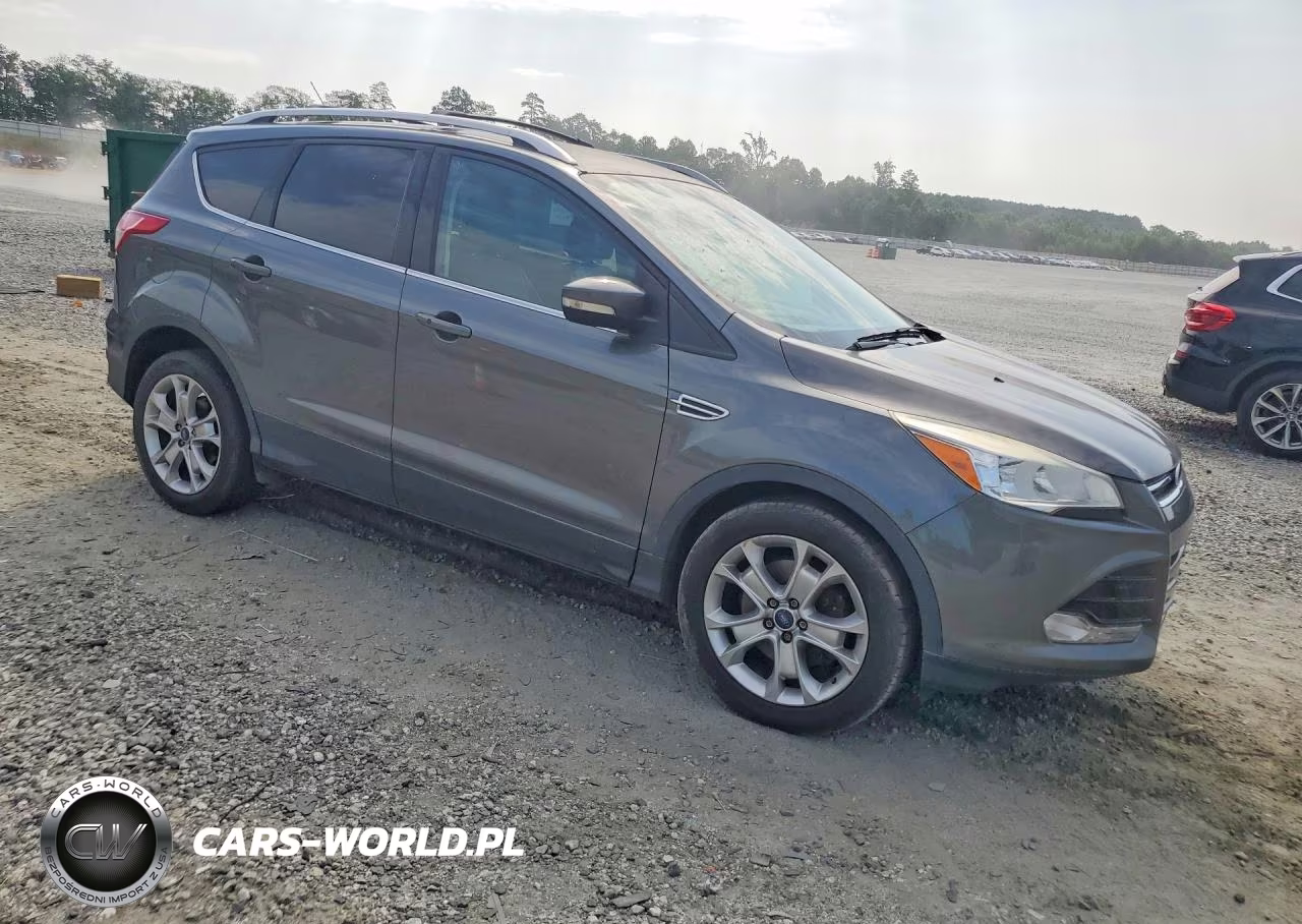 2016 Ford Escape Titanium VIN:1FMCU9JX0GUA25609 - 4