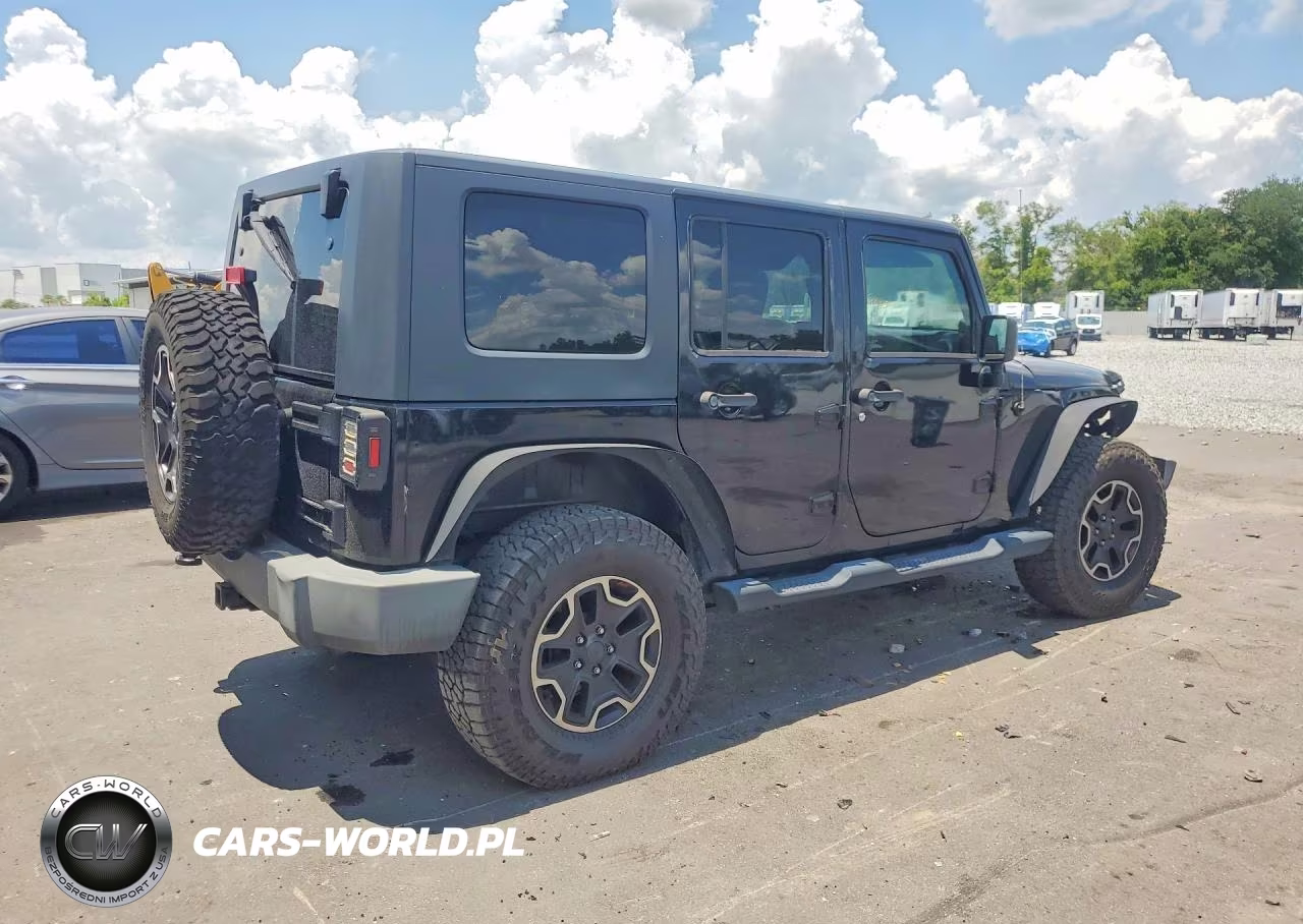2009 Jeep Wrangler Unlimited Sahara VIN:1J4GA591X9L705012 - 3