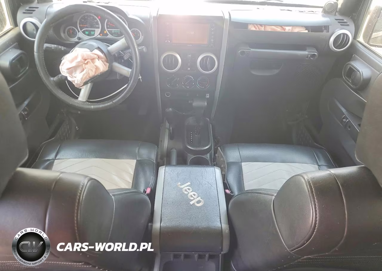 2009 Jeep Wrangler Unlimited Sahara VIN:1J4GA591X9L705012 - 8
