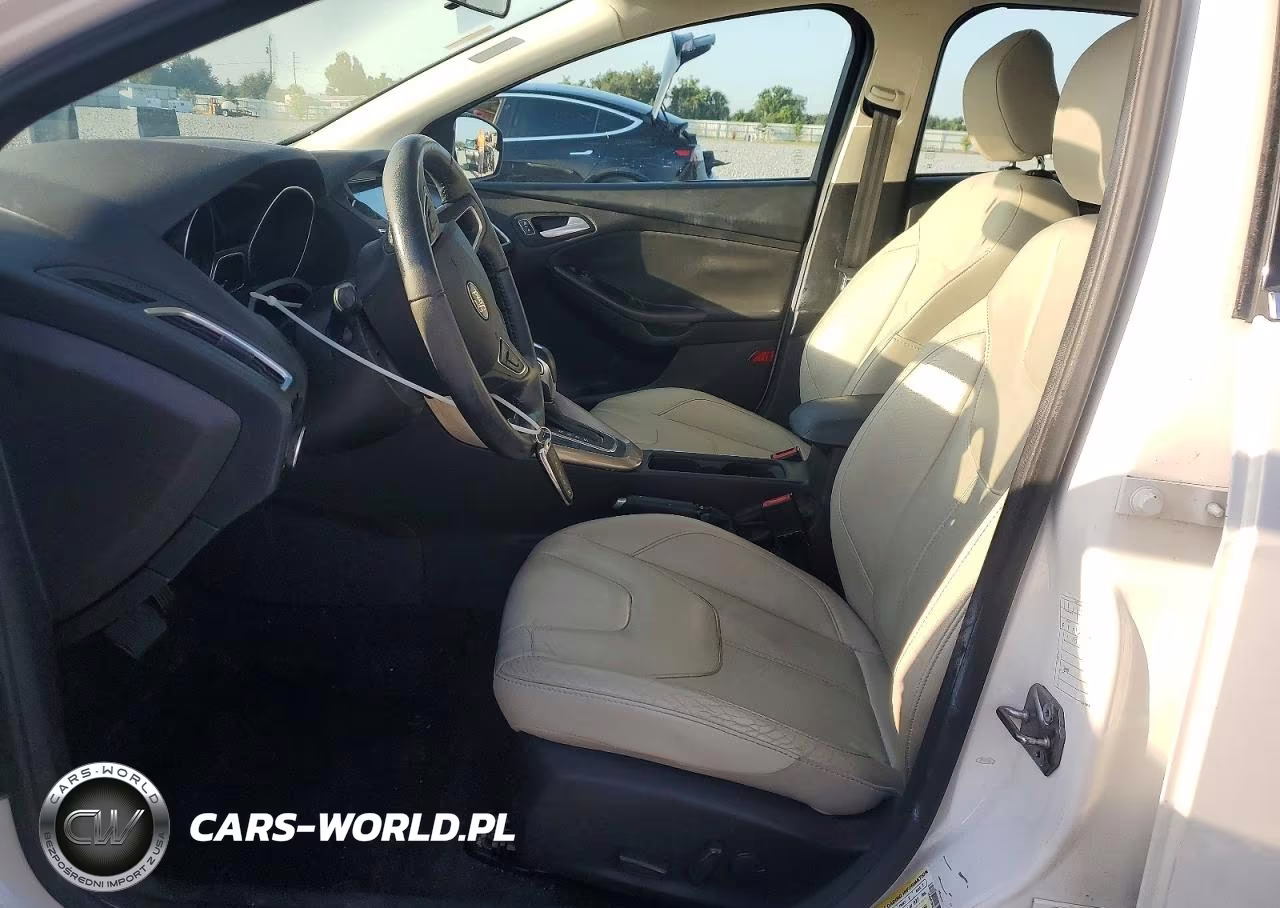 2016 Ford Focus Titanium VIN:1FADP3N23GL299393 - 7