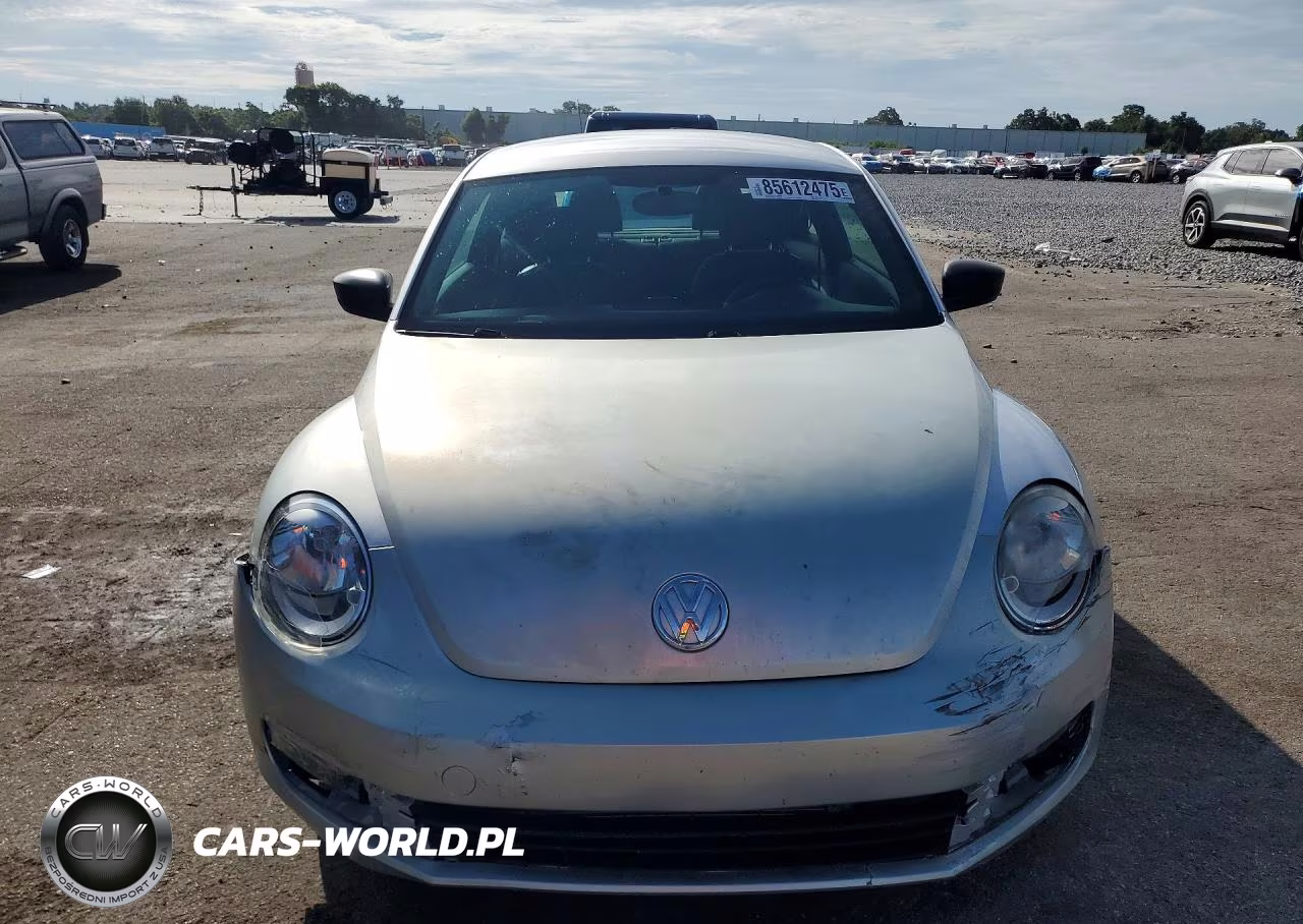 2014 Volkswagen Beetle VIN:3VWFP7AT7EM624094 - 5