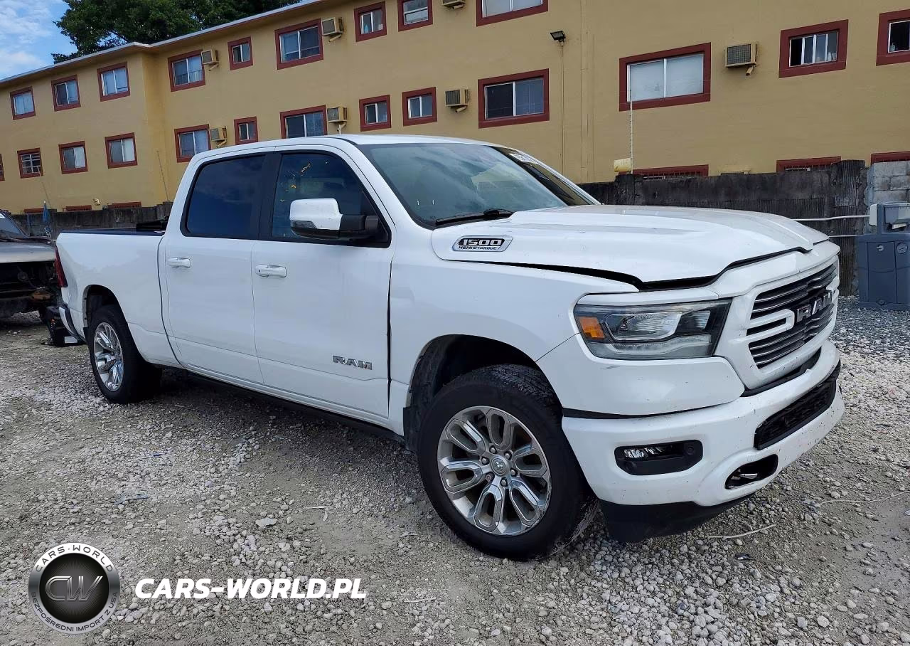 2023 Ram 1500 Laramie VIN:1C6SRFRT1PN617622 - 4