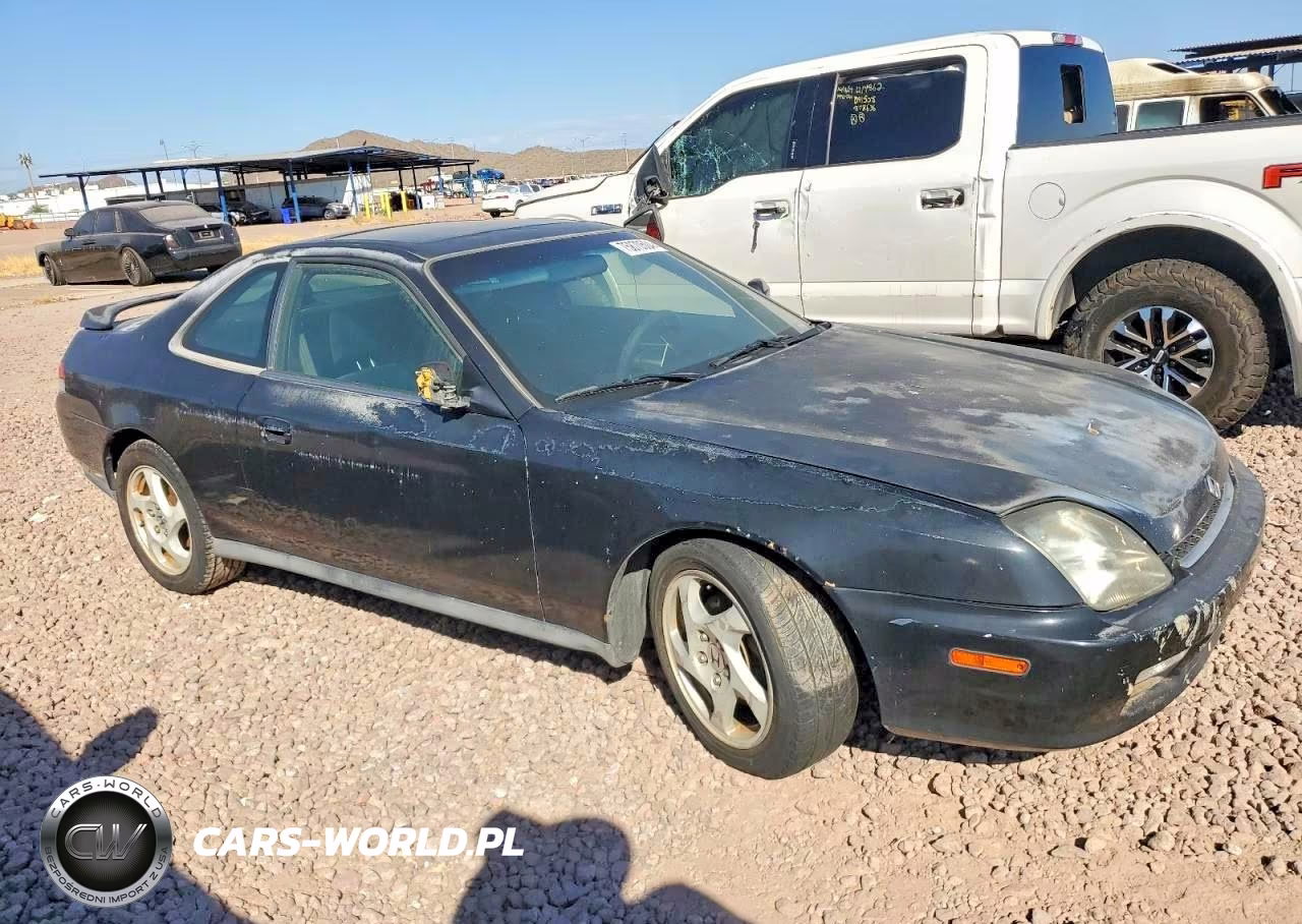 1999 Honda Prelude VIN:JHMBB624XXC002223 - 4