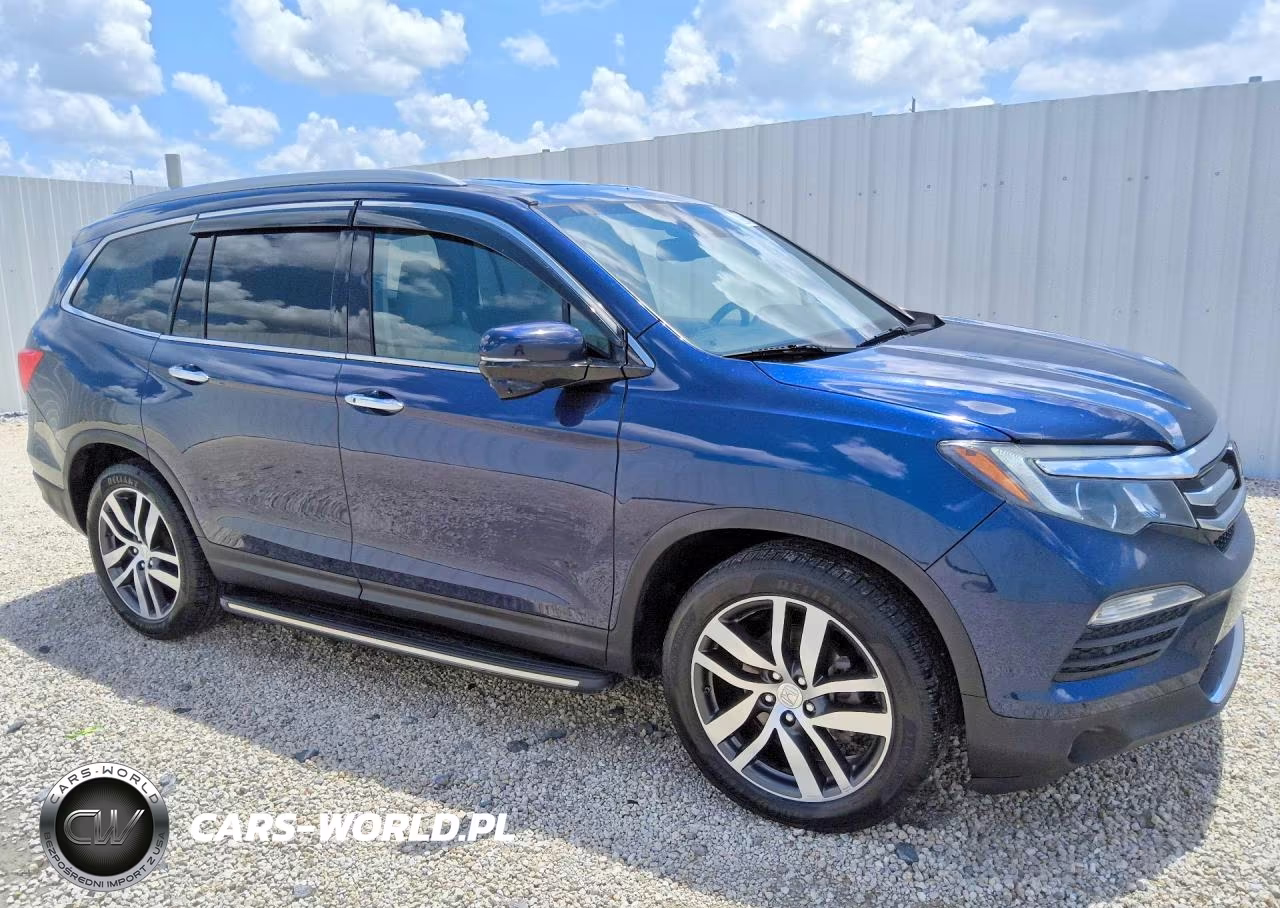 2016 Honda Pilot Touring VIN:5FNYF6H94GB021890 - 4