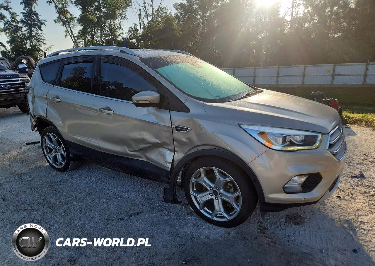 2017 Ford Escape Titanium VIN:1FMCU0J96HUE01759 - 4