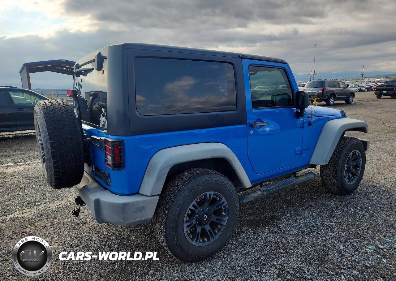 2011 Jeep Wrangler Sport VIN:1J4AA2D13BL548926 - 3