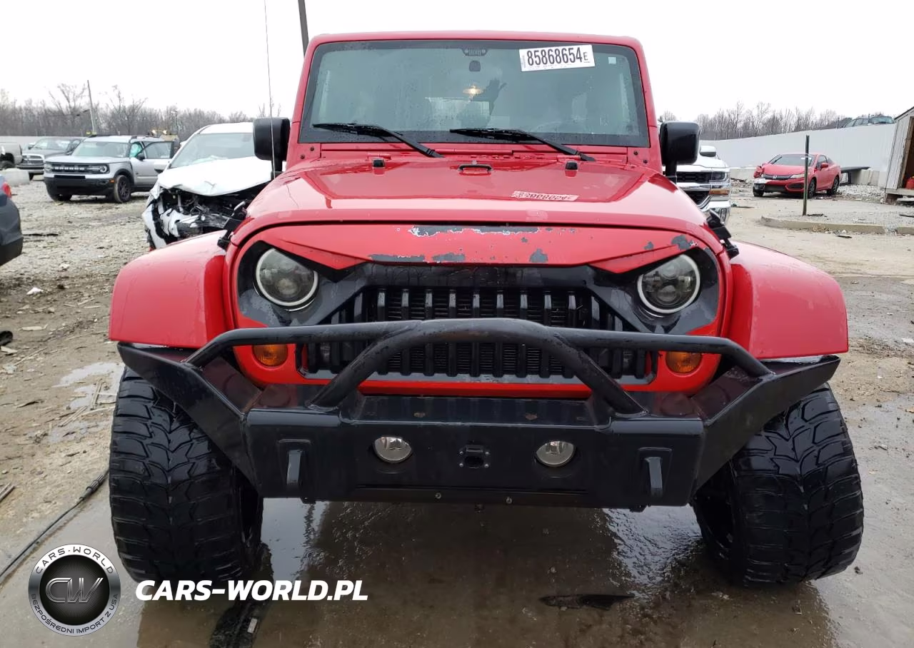 2012 Jeep Wrangler Unlimited Sahara VIN:1C4BJWEG6CL113999 - 5