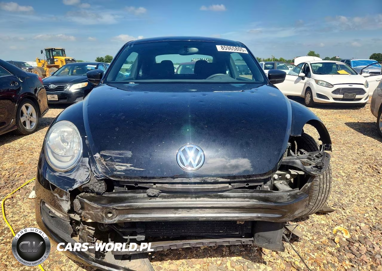 2014 Volkswagen Beetle VIN:3VWFP7AT3EM610015 - 5