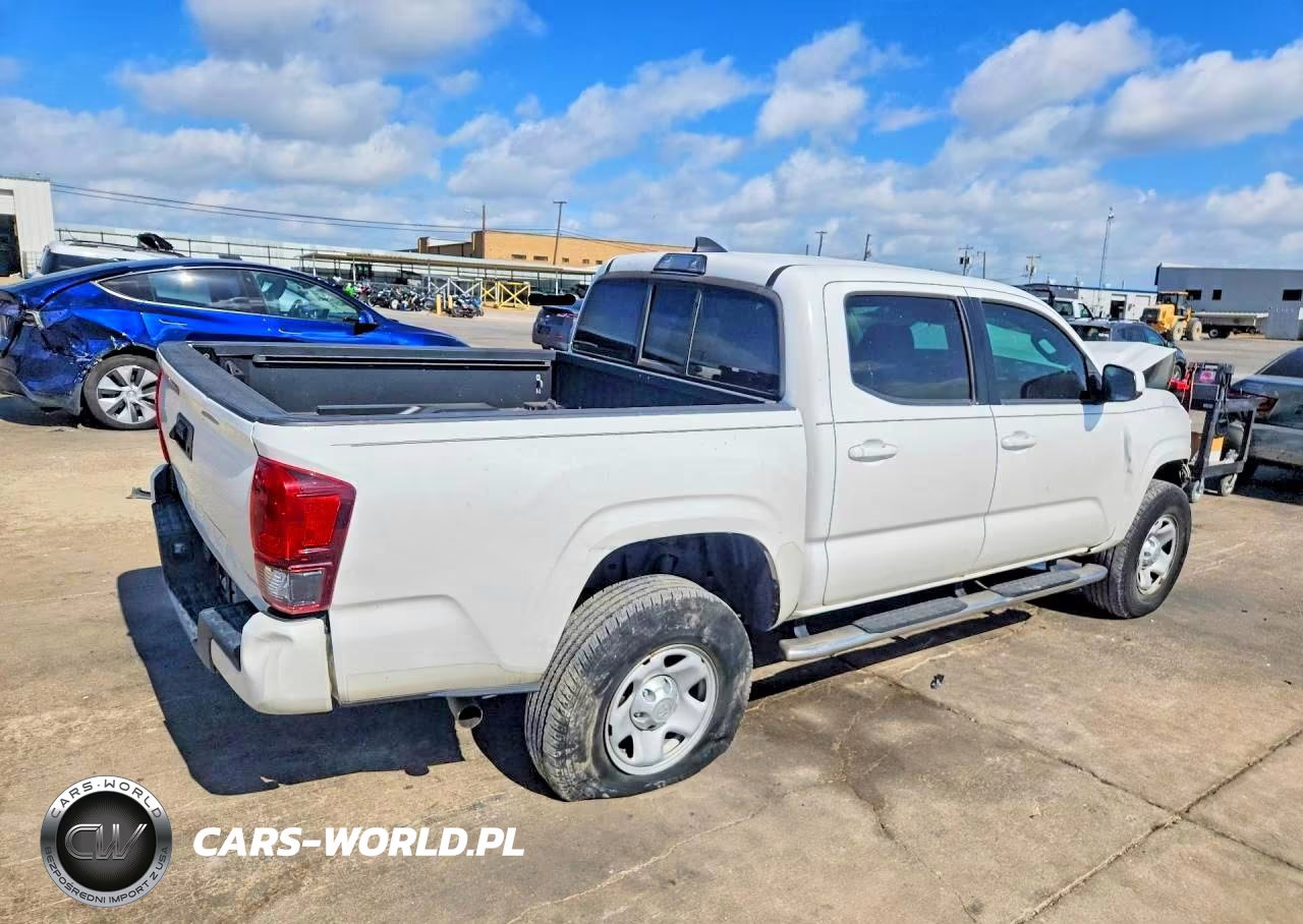 2018 Toyota Tacoma Sr VIN:5TFAX5GN3JX116994 - 3