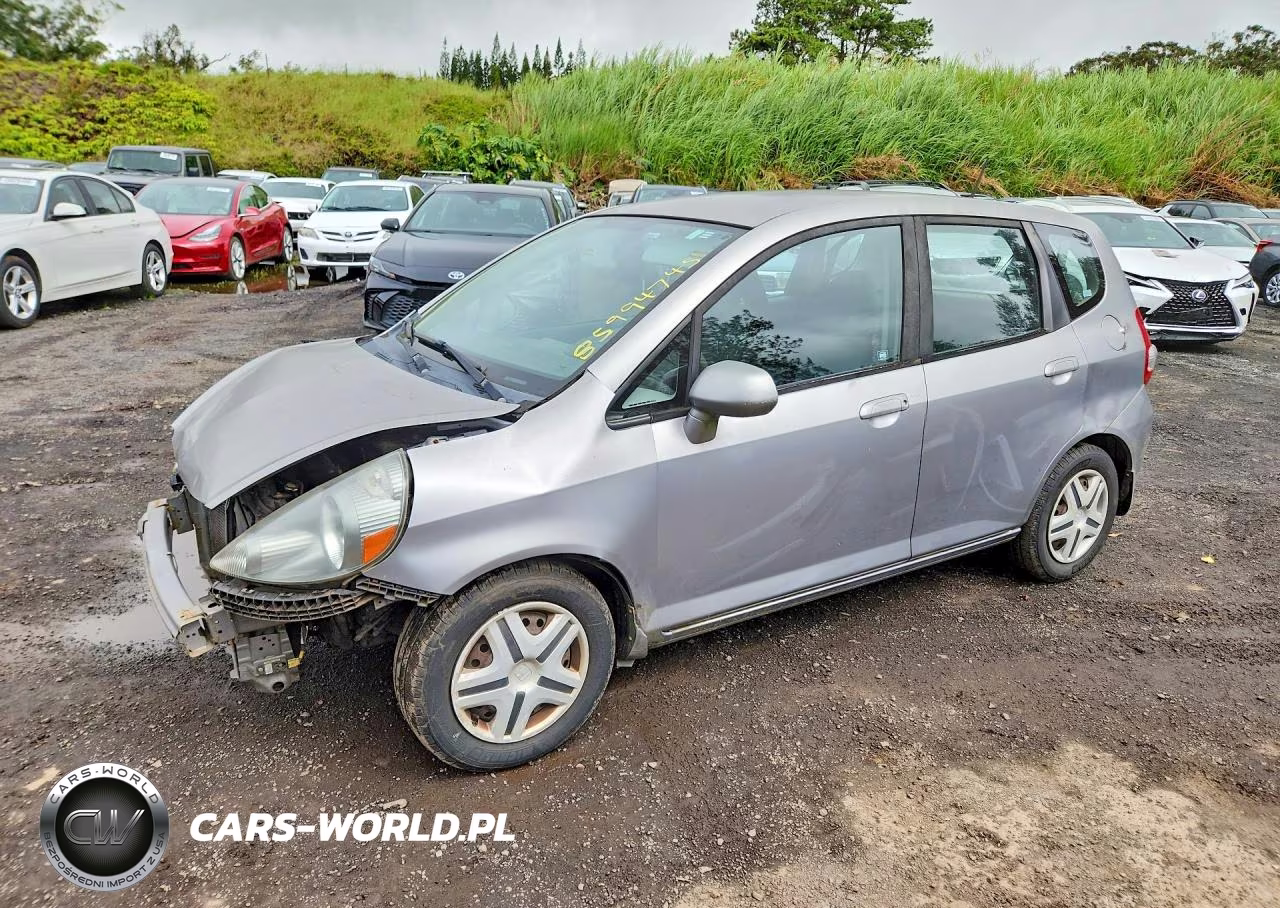 2007 Honda Fit VIN:JHMGD38417S042556 - 1