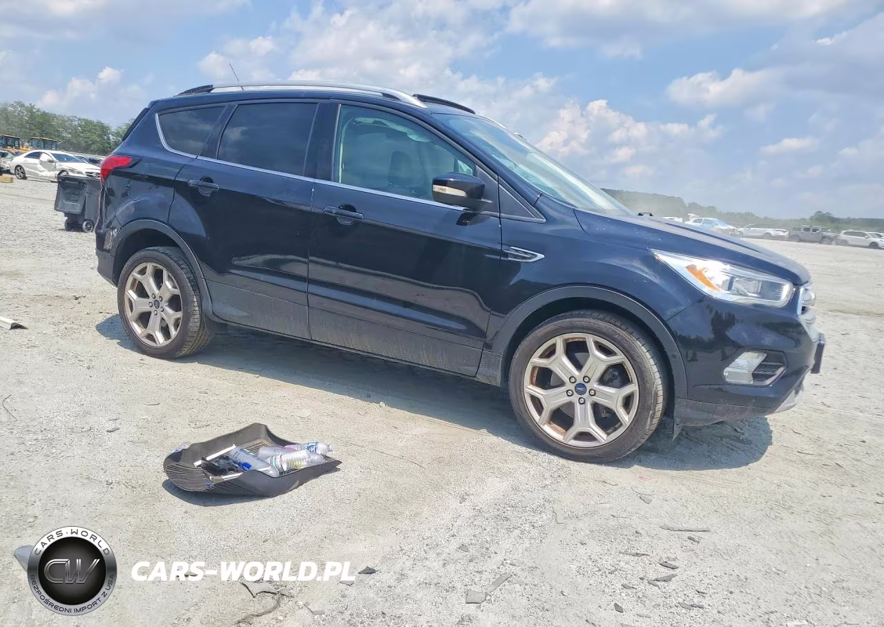 2019 Ford Escape Titanium VIN:1FMCU9J96KUB11677 - 4
