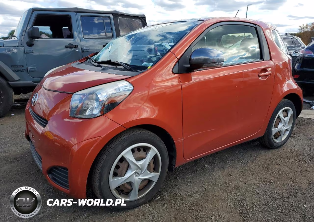 2012 Toyota Scion Iq VIN:JTNJJXB08CJ020160 - 1