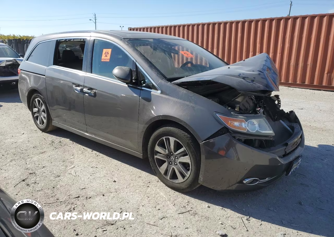 2014 Honda Odyssey Touring VIN:5FNRL5H92EB003943 - 4