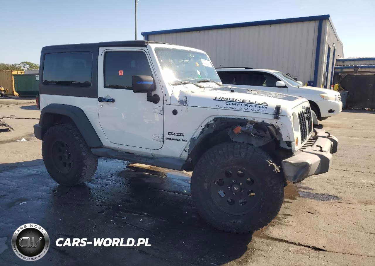 2011 Jeep Wrangler Sport VIN:1J4AA2D13BL598984 - 4