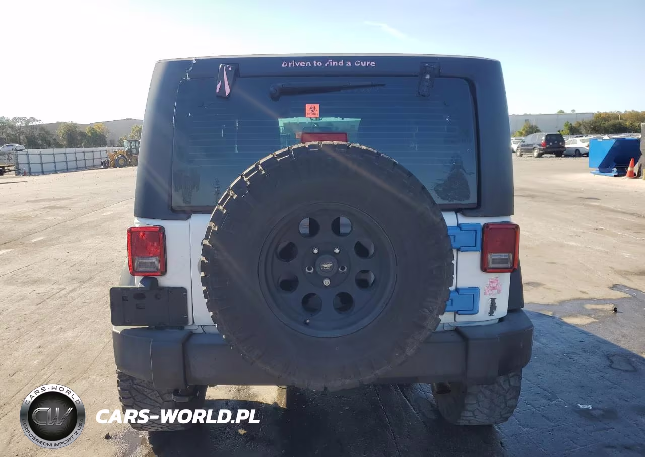 2011 Jeep Wrangler Sport VIN:1J4AA2D13BL598984 - 6