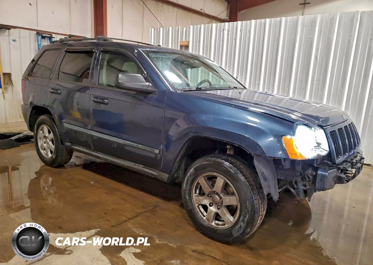 2009 Jeep Grand Cherokee Laredo VIN:1J8GR48K19C521475 - 4