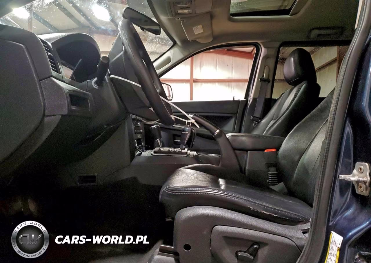2009 Jeep Grand Cherokee Laredo VIN:1J8GR48K19C521475 - 7