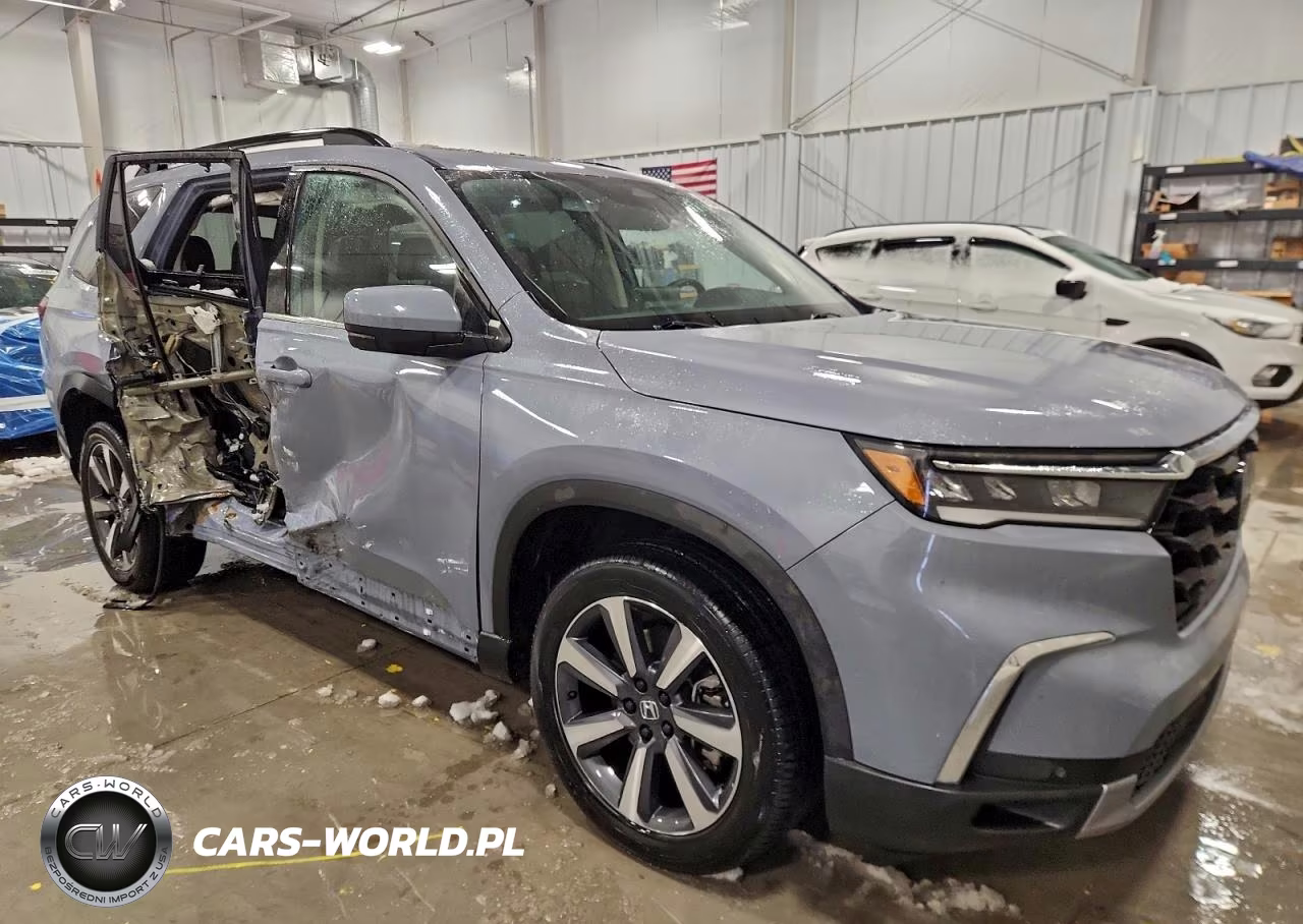 2023 Honda Pilot Touring VIN:5FNYG1H76PB008105 - 4