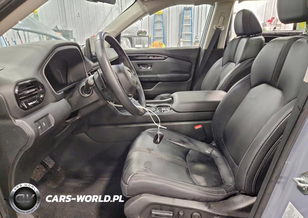 2023 Honda Pilot Touring VIN:5FNYG1H76PB008105 - 7