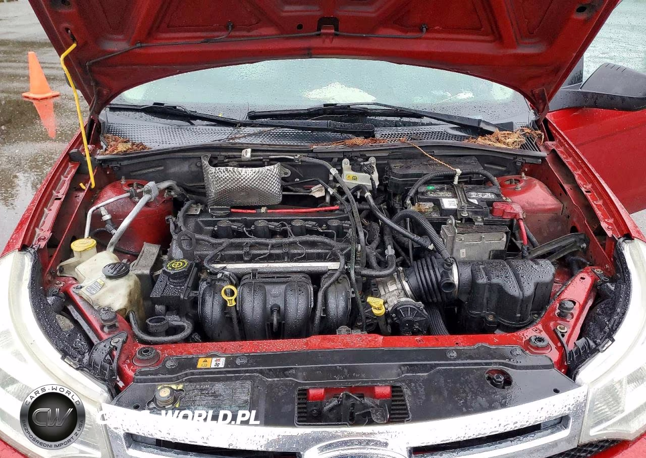 2009 Ford Focus 4D VIN:1FAHP35N19W145441 - 11