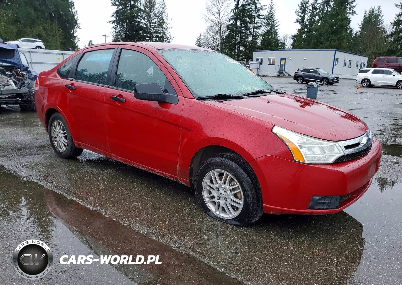 2009 Ford Focus 4D VIN:1FAHP35N19W145441 - 4
