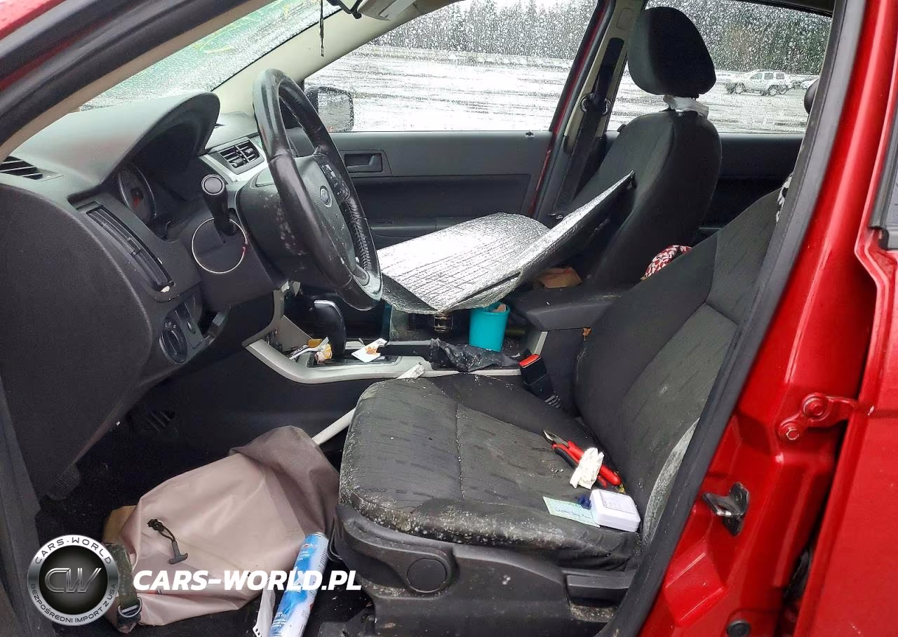 2009 Ford Focus 4D VIN:1FAHP35N19W145441 - 7